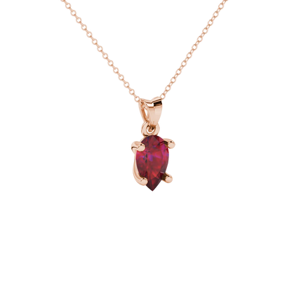 Close-up, pear shape raspberry red gemstone pendant, rose gold classic basket.