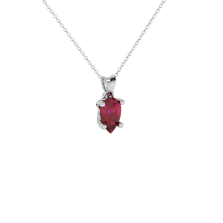 Close-up raspberry red gemstone pendant, white gold lotus basket.