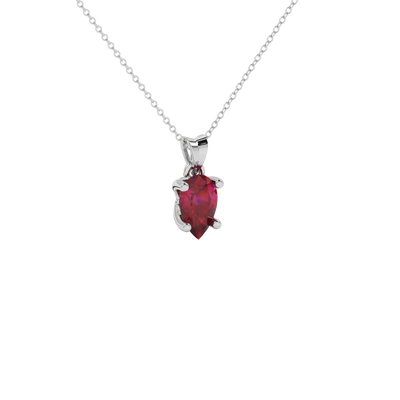 Close-up raspberry red gemstone pendant, white gold lotus basket.