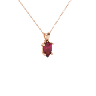 Close-up, pear shape raspberry red gemstone pendant, rose gold lotus basket.