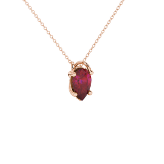 Close-up, pear shape raspberry red gemstone pendant, rose gold pavé basket.