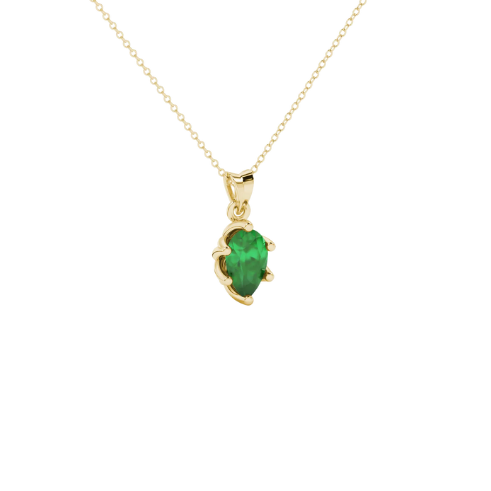 Close-up, pear shape emerald green gemstone, yellow gold scalloped pendant.