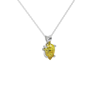 Close-up canary yellow gemstone pendant, white gold surprise diamond setting.