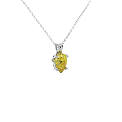 Close-up canary yellow gemstone pendant, white gold surprise diamond setting.