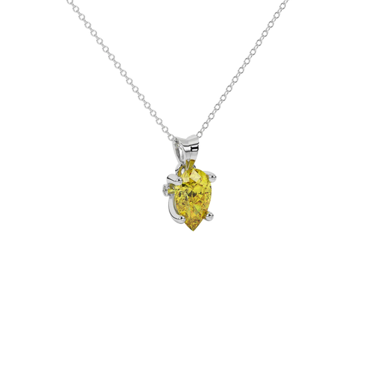 Close-up canary yellow gemstone pendant, white gold surprise diamond setting.