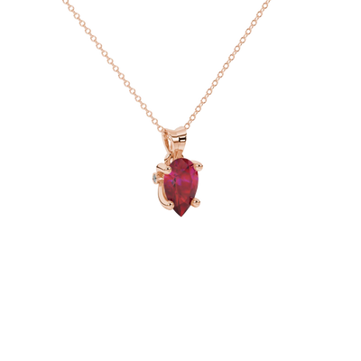 Close-up, pear shape raspberry red gemstone pendant, rose gold surprise diamond setting.