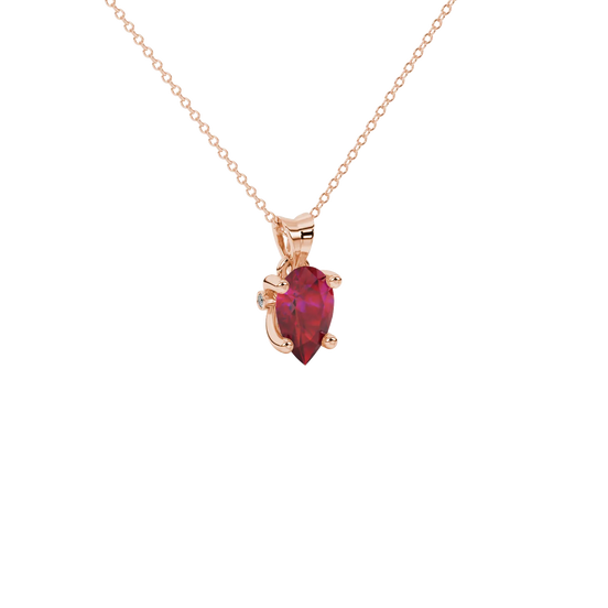 Close-up, pear shape raspberry red gemstone pendant, rose gold surprise diamond setting.