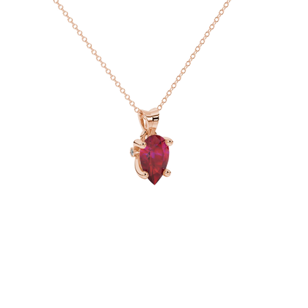 Close-up, pear shape raspberry red gemstone pendant, rose gold surprise diamond setting.