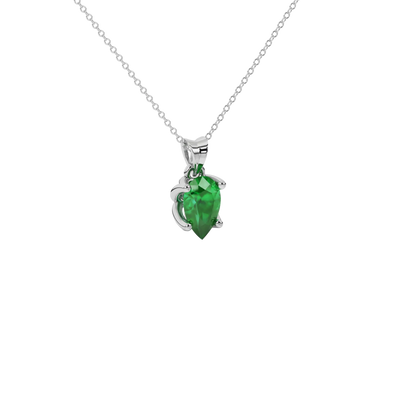 Close-up emerald green gemstone, white gold tulip basket.