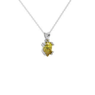Close-up canary yellow gemstone pendant, white gold vintage basket.