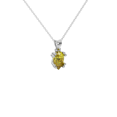 Close-up canary yellow gemstone pendant, white gold vintage basket.