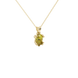 Close-up, pear shape canary yellow gemstone, yellow gold vintage basket pendant.