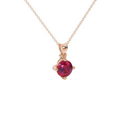 close-up shot of a round raspberry red gemstone pendant with a rose gold classic basket design.