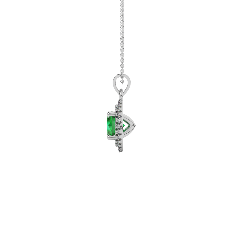 Side view of a white gold emerald green gemstone pendant featuring a brilliant falling edge halo.