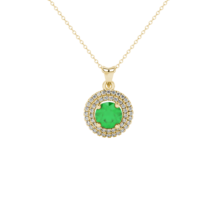 Close-up details of a round-cut emerald green gemstone in a yellow gold diamond falling edge halo pendant.