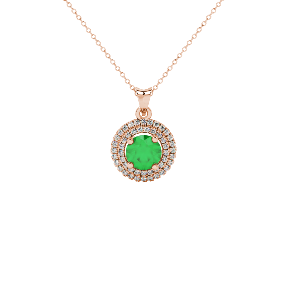 Close-up macro shot of a round emerald green gemstone pendant with a rose gold diamond falling edge halo