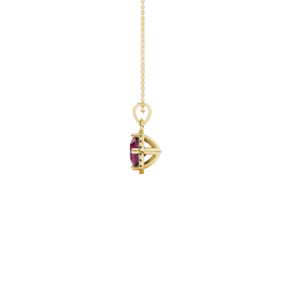 Side view of a yellow gold raspberry red gemstone pendant with a detailed French pavé halo design.