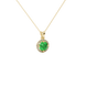 Close-up details of a round-cut emerald green gemstone in a yellow gold diamond French pavé halo pendant.