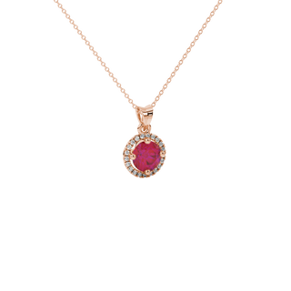 raspberry red gemstone halo pendant in rose gold