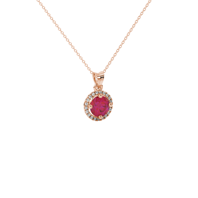 raspberry red gemstone halo pendant in rose gold