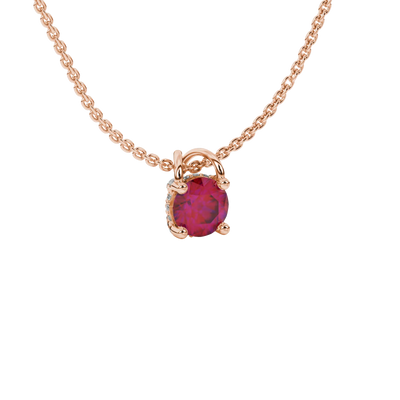 close-up shot of a round raspberry red gemstone pendant with a diamond pavé basket in rose gold.