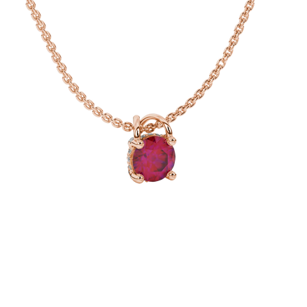 close-up shot of a round raspberry red gemstone pendant with a diamond pavé basket in rose gold.