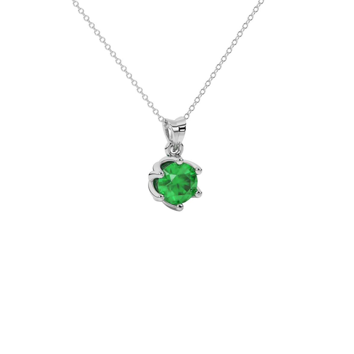 close-up of a round emerald green gemstone enclosed in a white gold scalloped six-prong pendant setting.