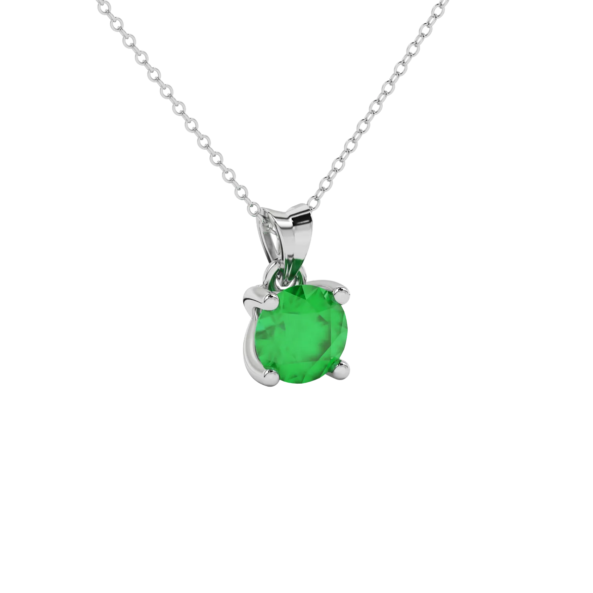 close-up of a round emerald green gemstone enclosed in a white gold surprise diamond pendant setting.