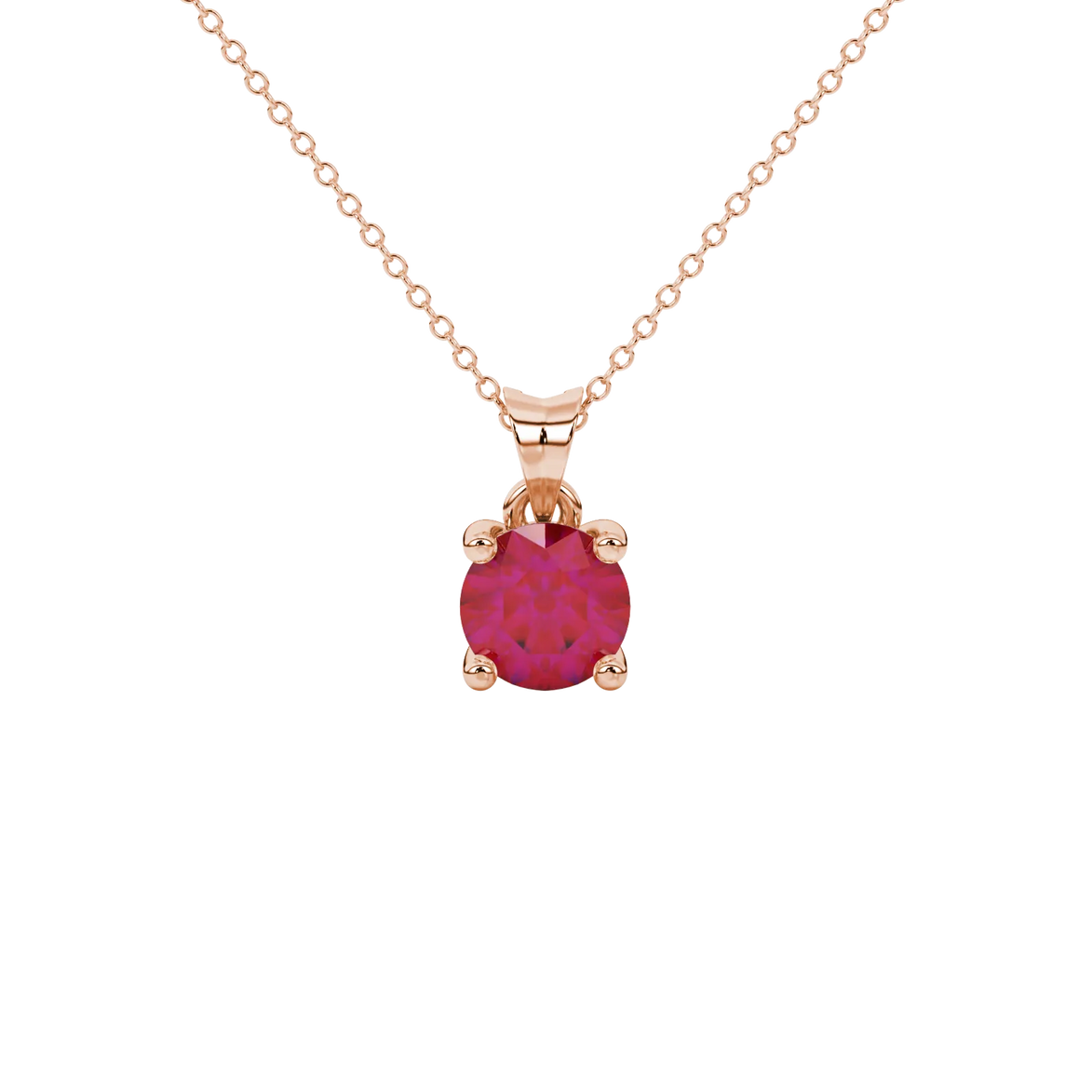 Round-cut raspberry red gemstone pendant in a rose gold surprise diamond setting.