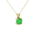 Close-up details of a round-cut emerald green gemstone in a yellow gold surprise diamond pendant.