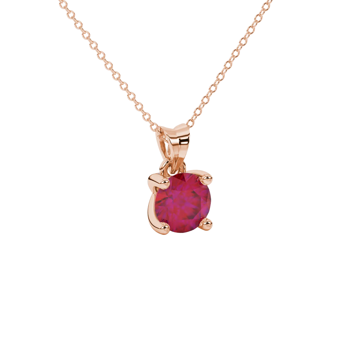 close-up shot of a round raspberry red gemstone pendant with a rose gold surprise diamond setting design.