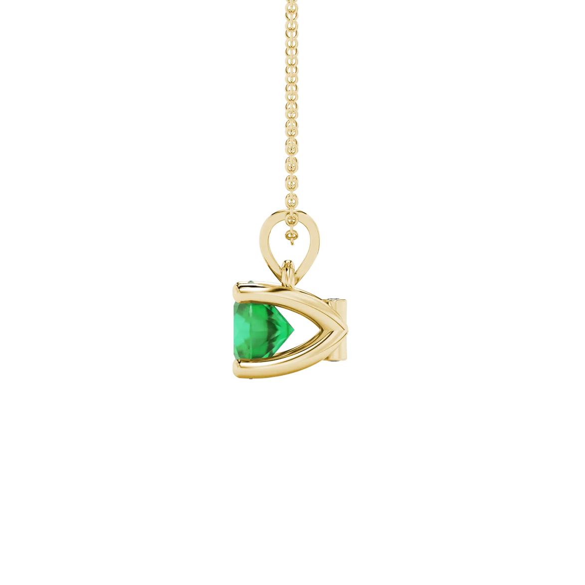 Side profile of a yellow gold emerald green gemstone pendant with a surprise diamond design.