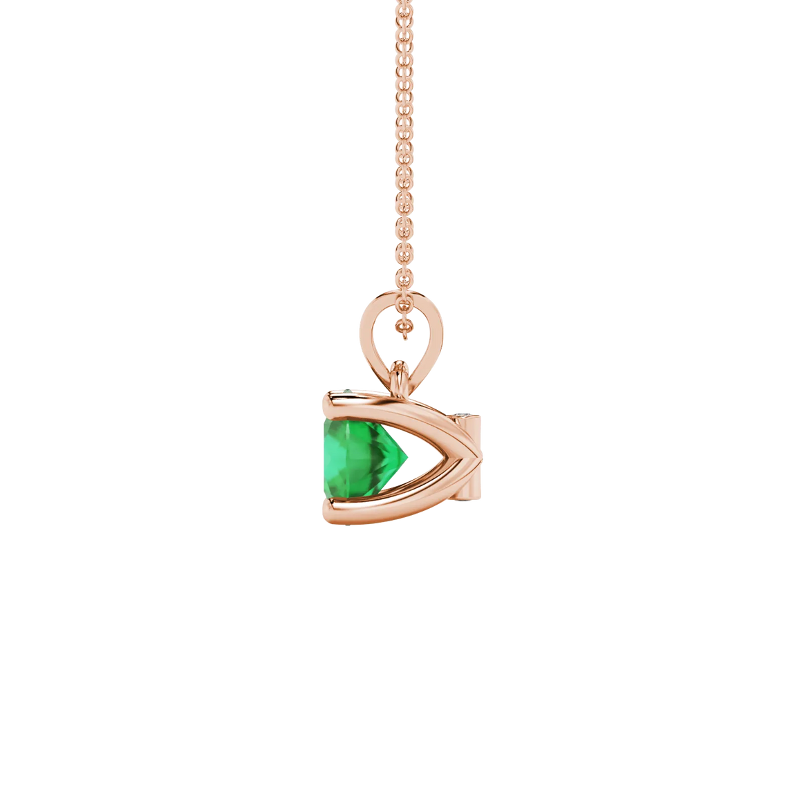 Side angle of a rose gold emerald green gemstone pendant showcasing the surprise diamond setting.