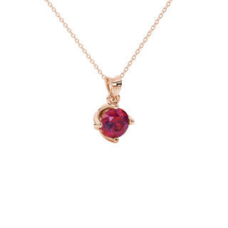 Close-up shot of a round raspberry red gemstone pendant with a rose gold tulip basket design.