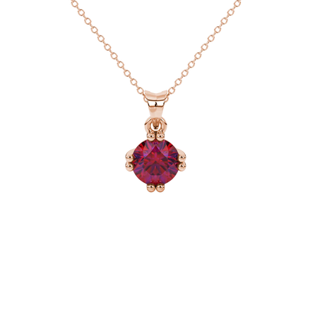 Round-cut raspberry red gemstone pendant in a rose gold vintage basket setting.