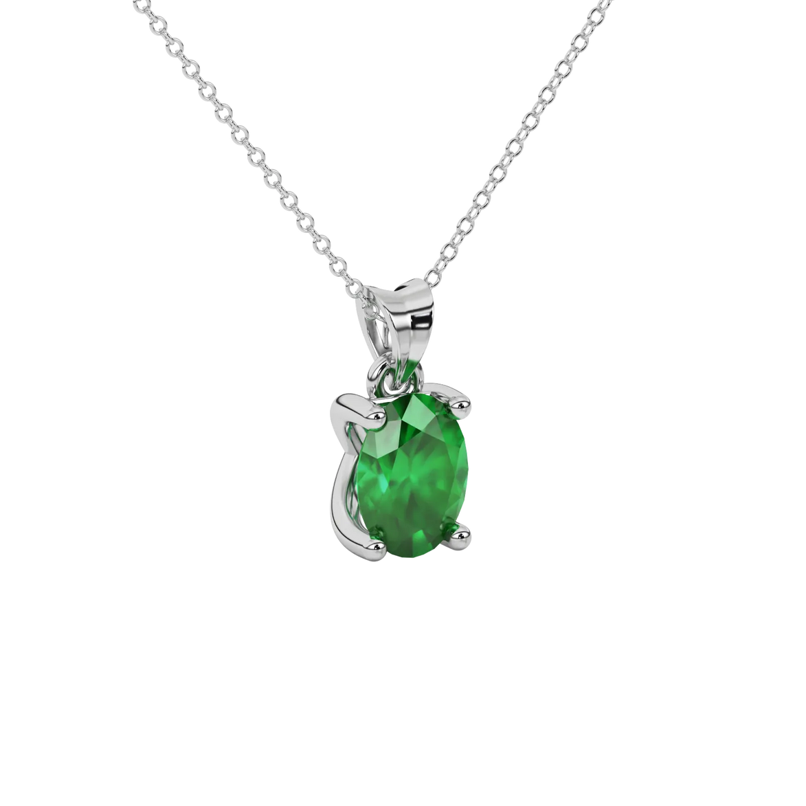 Close-up oval cut emerald green gemstone pendant, white gold four prong setting.