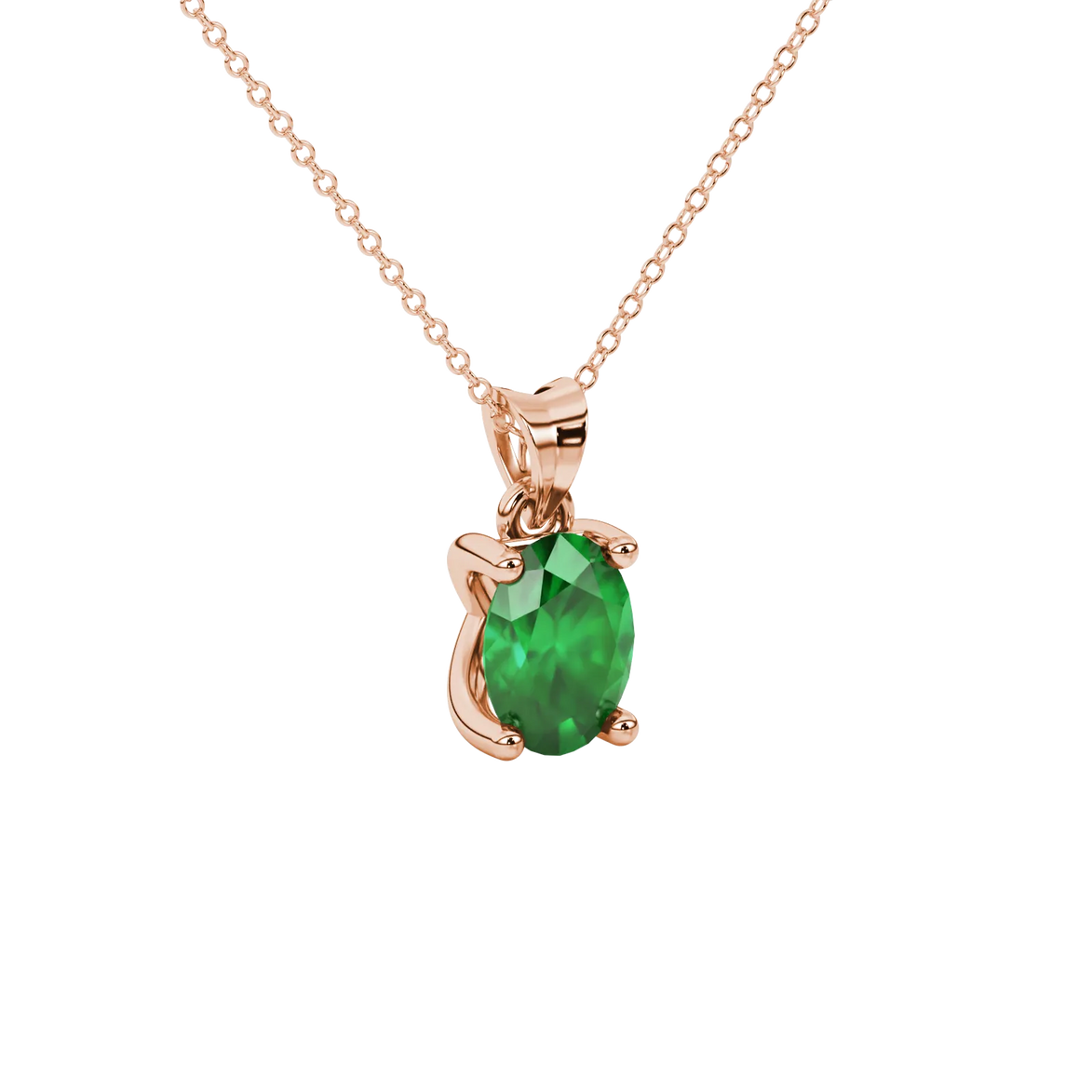 Close-up, oval cut emerald green gemstone pendant, rose gold four prong setting.