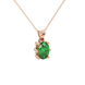 Close-up, oval cut emerald green gemstone pendant, rose gold six prong setting.