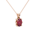 Close-up, oval cut raspberry red gemstone pendant, rose gold six prong setting.