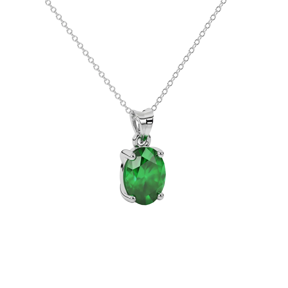 Close-up oval cut emerald green gemstone pendannt, white gold classic basket.