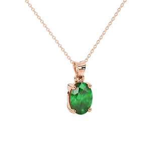 Close-up, oval cut emerald green gemstone pendant, rose gold classic basket.