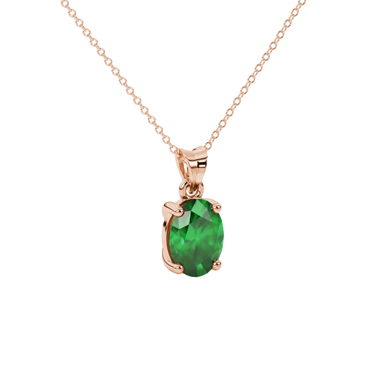 Close-up, oval cut emerald green gemstone pendant, rose gold classic basket.