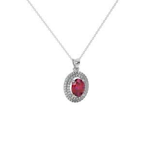 Close-up raspberry red gemstone pendant, white gold falling edge halo.