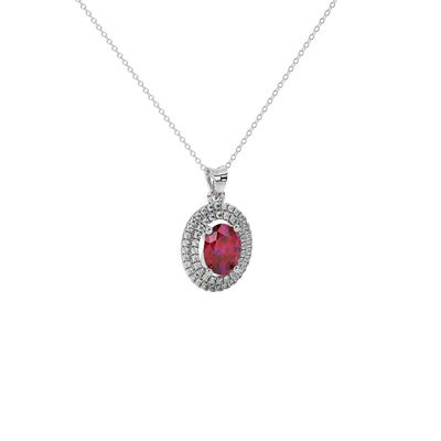 Close-up raspberry red gemstone pendant, white gold falling edge halo.