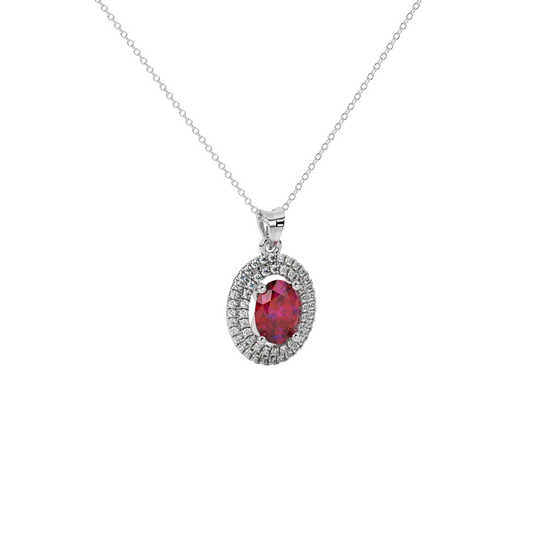 Close-up raspberry red gemstone pendant, white gold falling edge halo.