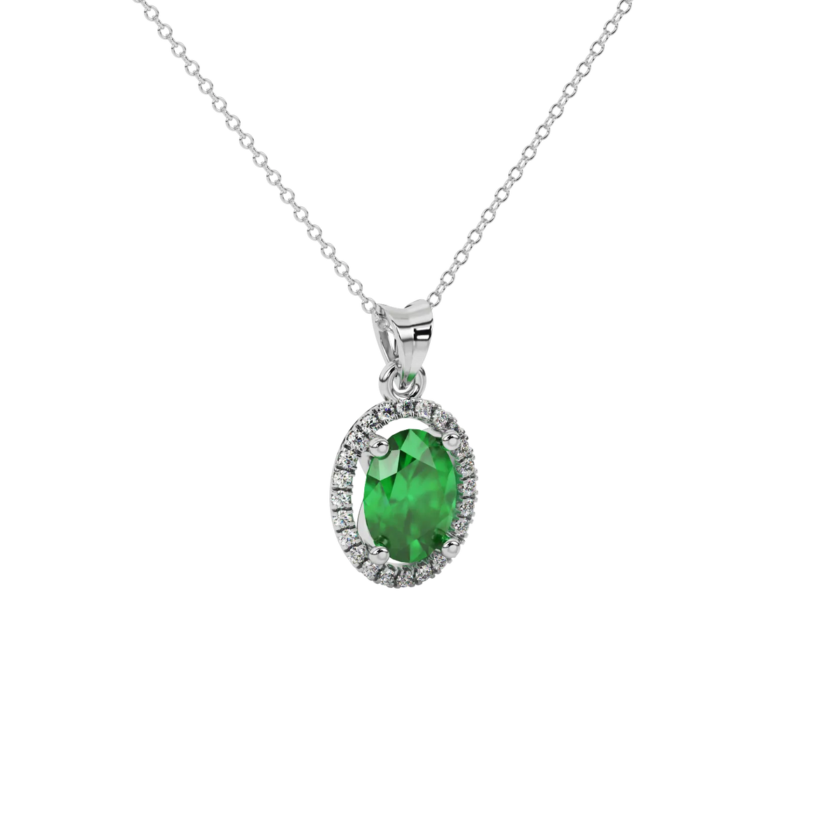 Close-up emerald green gemstone pendant, white gold french pavé halo.