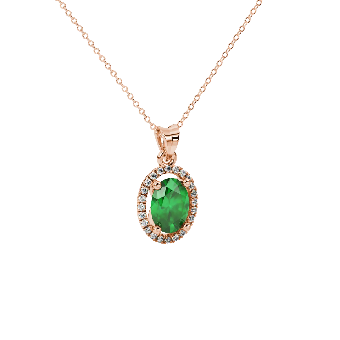 Close-up, oval cut emerald green gemstone pendant, rose gold french pavé halo.