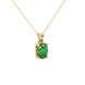 Close-up, oval cut emerald green gemstone, yellow gold lotus basket pendant.