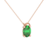 Close-up, oval cut emerald green gemstone pendant, rose gold pavé basket.