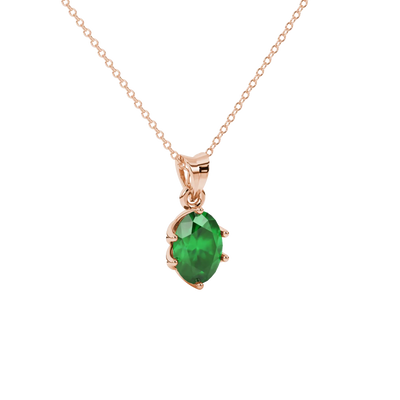 Close-up, oval cut emerald green gemstone pendant, rose gold scalloped six prong setting.